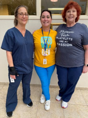 BBD's Joy Delucia posing with BBD blood collection techs.