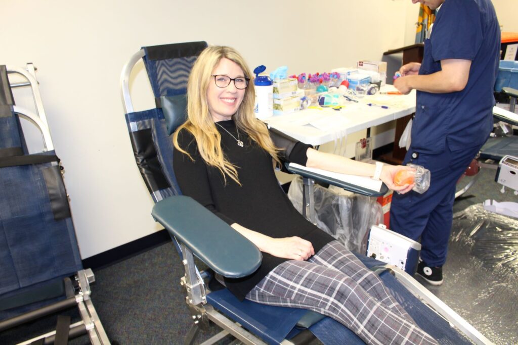 Woman donating blood.